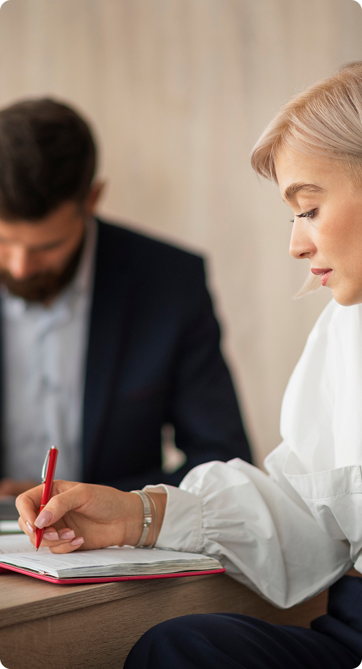 Therapist taking notes during consultation