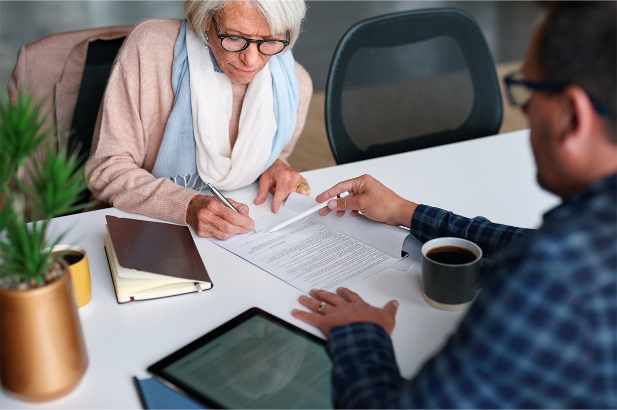 Client reviewing a business contract during a legal consultation