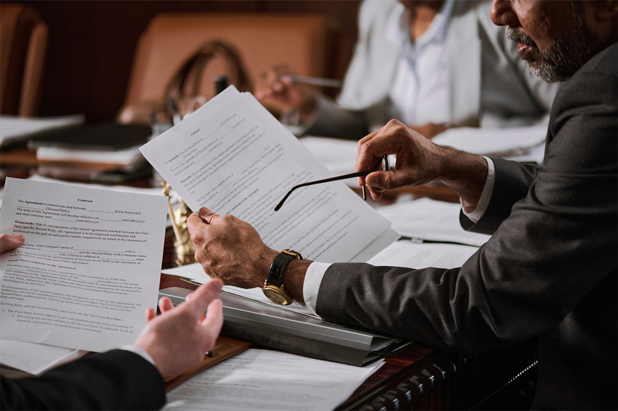 Attorneys reviewing drafted legal documents during case preparation